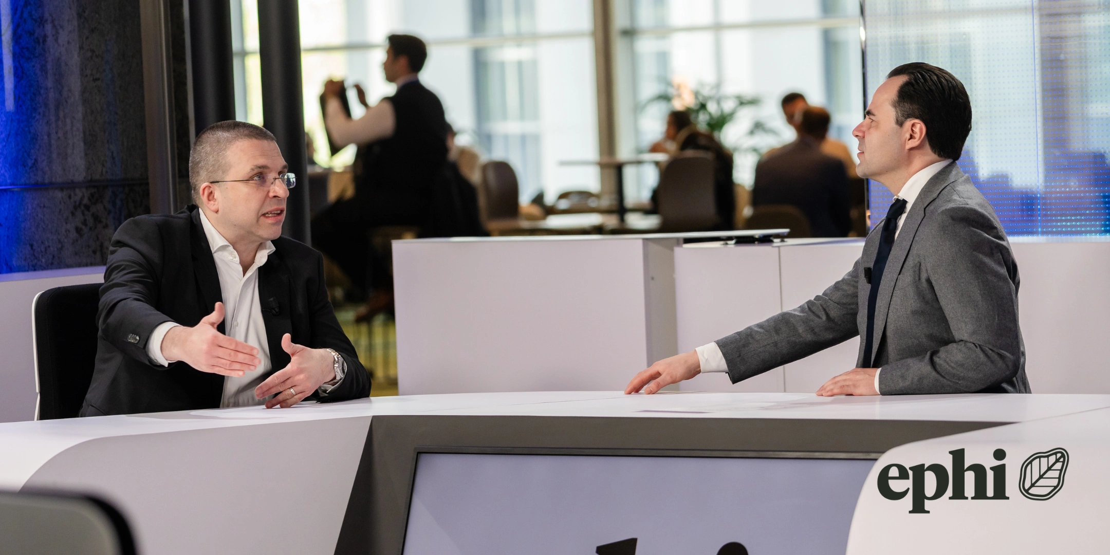 Adam Schlussler talking with Tomislav Sokol. Adam Schlussler talking with Tomislav Sokol.